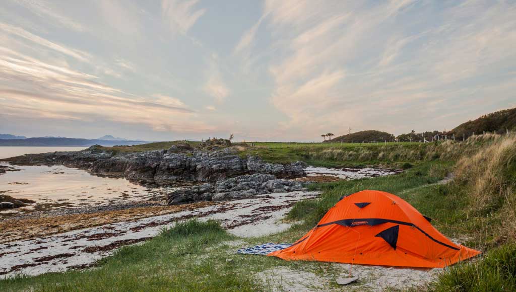 People camping in a mountain - Camp Adventures- camping program